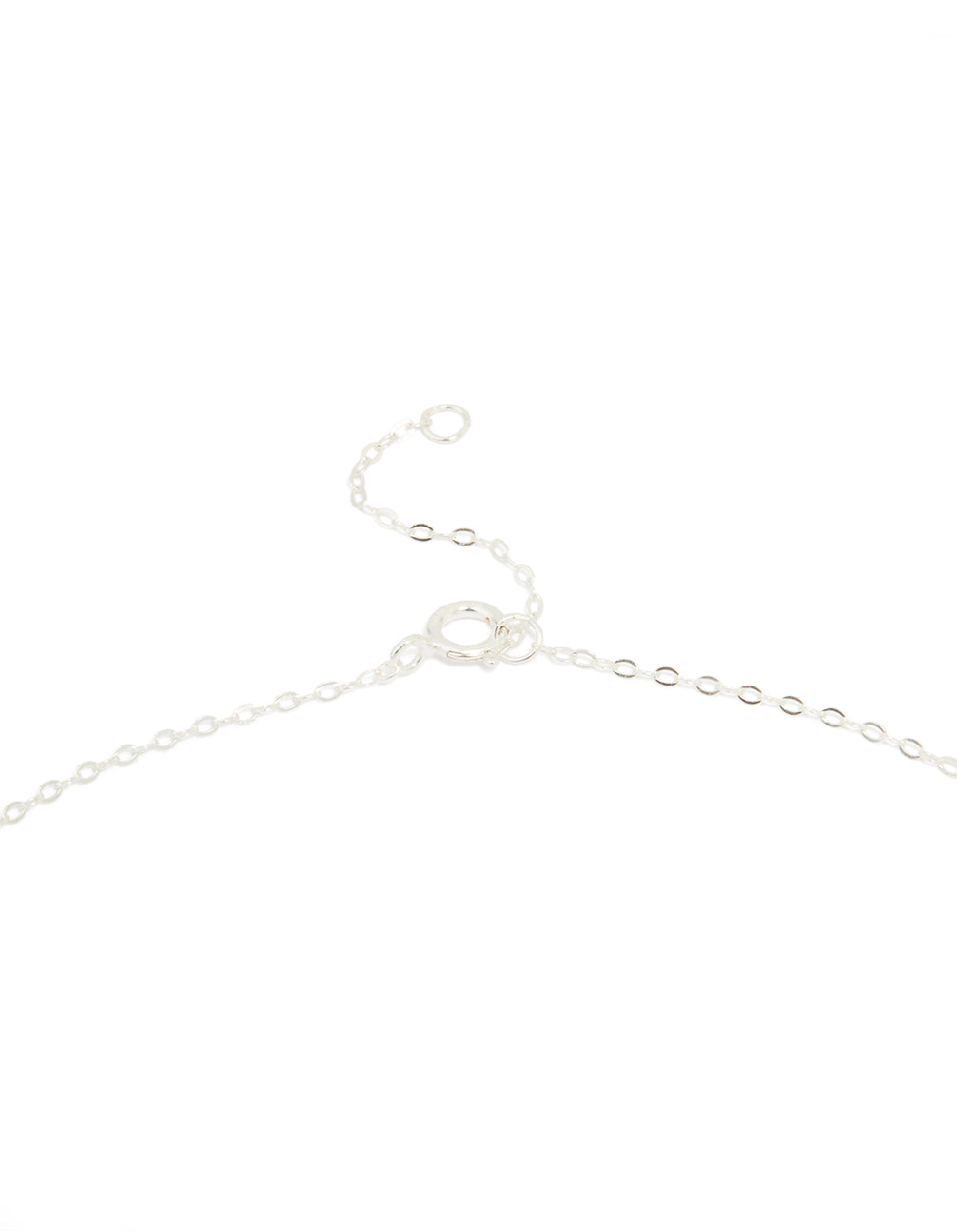 Close-up of sterling silver blue cubic zirconia and starfish pendant necklace highlighting ocean charm details with delicate crystal finish clasp detail view
