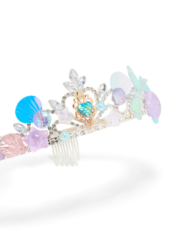 Featuring a kids metallic tiara headband with glitter ocean shell accents and clear stones in silver lavender aqua pink front view