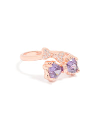 Showcasing a dainty bow ring crafted from rose gold featuring cubic zirconia stones in violet accents front view - link has visual effect only