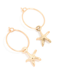 Showcasing gold starfish charm hoop earrings with ocean-inspired design front view - link has visual effect only