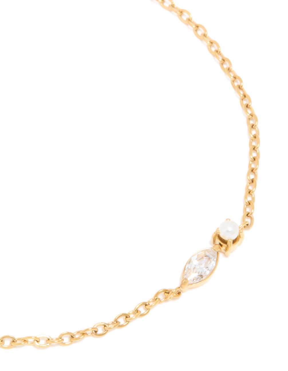 Designed with waterproof bracelet in gold plated stainless steel featuring cubic zirconia and pearl close up view