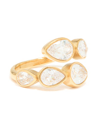 Crafted from waterproof gold plated stainless steel with pear cut cubic zirconia in clear accent, designed as a wrap ring close up view - link has visual effect only