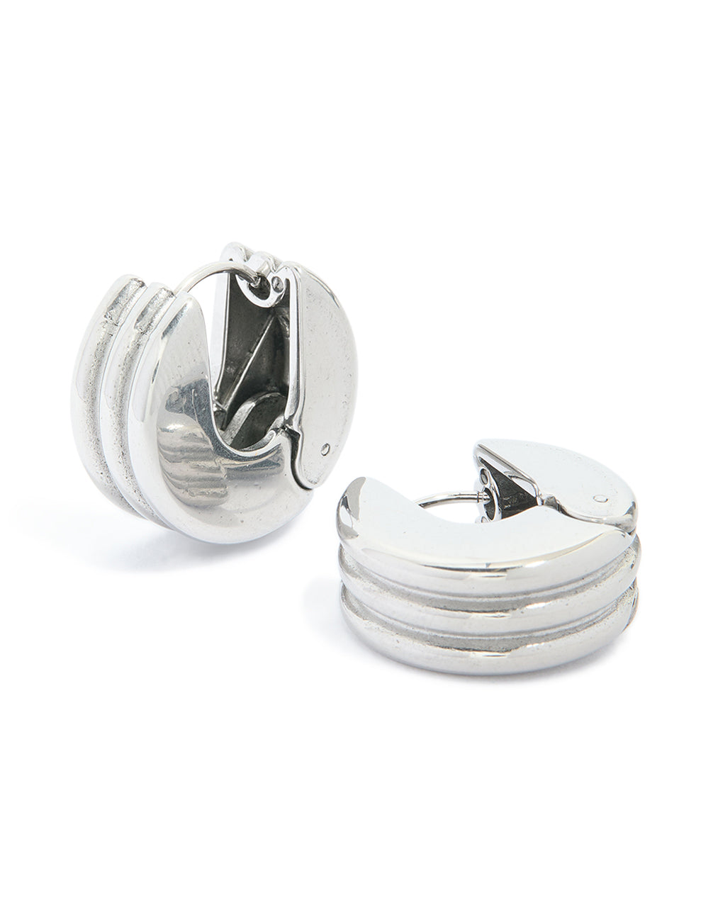 Featuring waterproof stainless steel ribbed circle hinged hoop earrings in silver front view