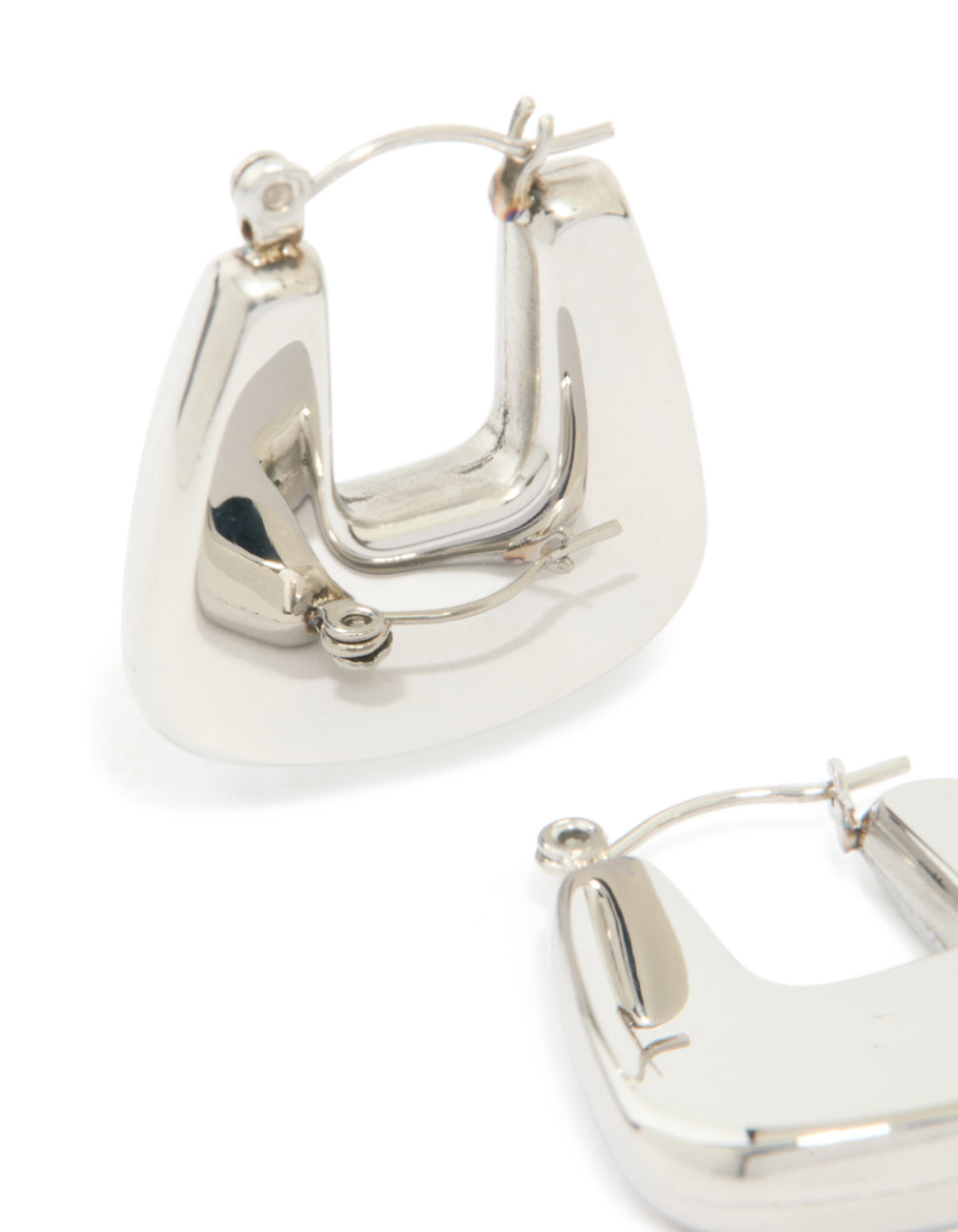 Crafted from waterproof stainless steel rounded square hoop earrings in silver post detail view