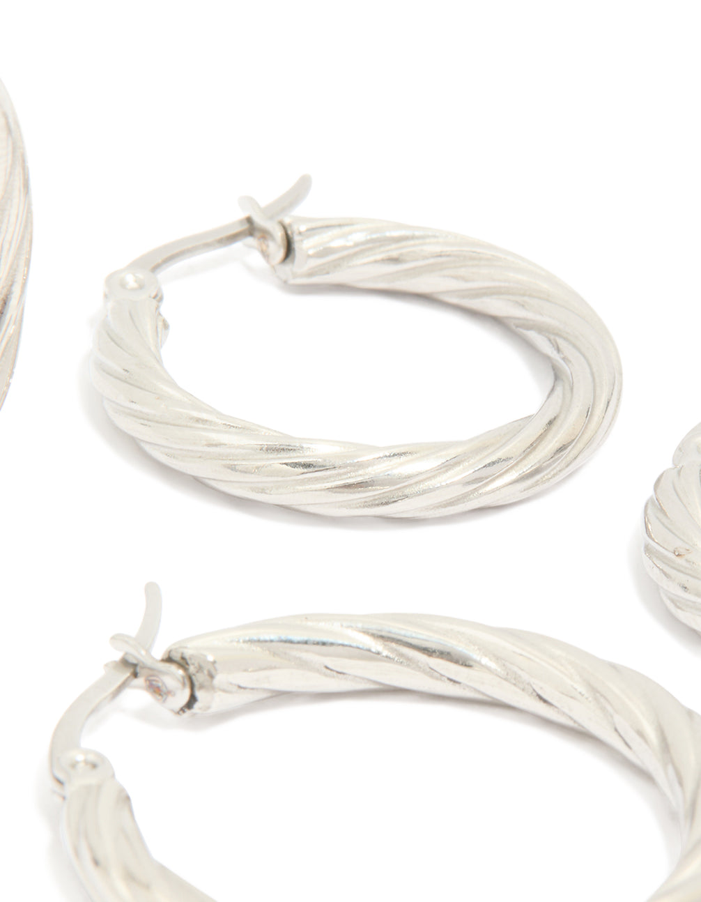 Crafted from waterproof stainless steel twisted hoop earrings in a 3-pack with silver finish post detail view