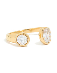 Showcasing a waterproof gold plated stainless steel open ring with oval and round cubic zirconia in front view - link has visual effect only