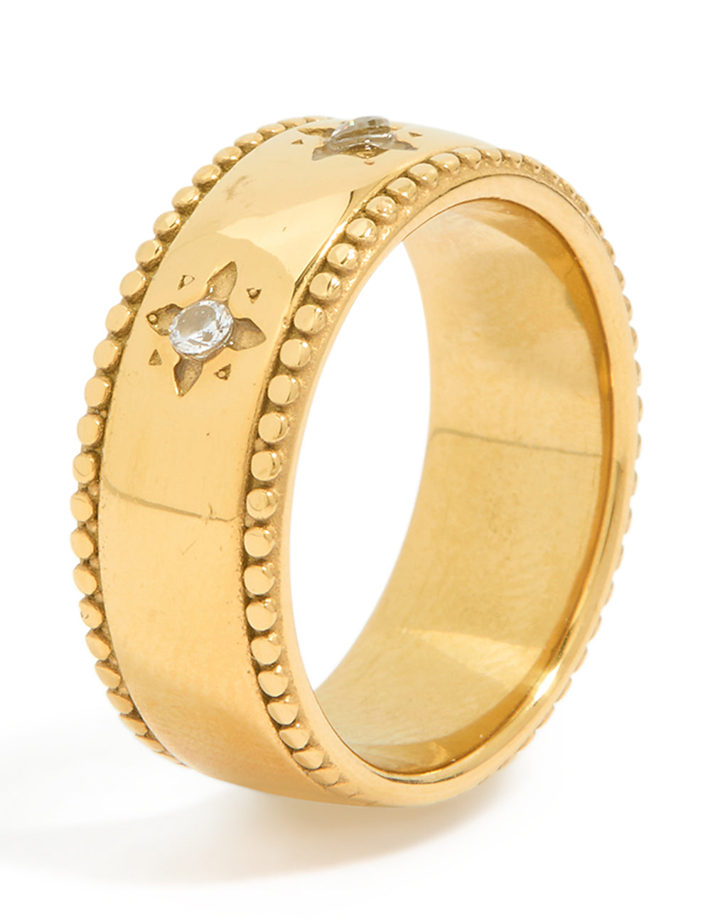 Featuring waterproof gold plated stainless steel and cubic zirconia, this star thick band ring with celestial detail side detail view