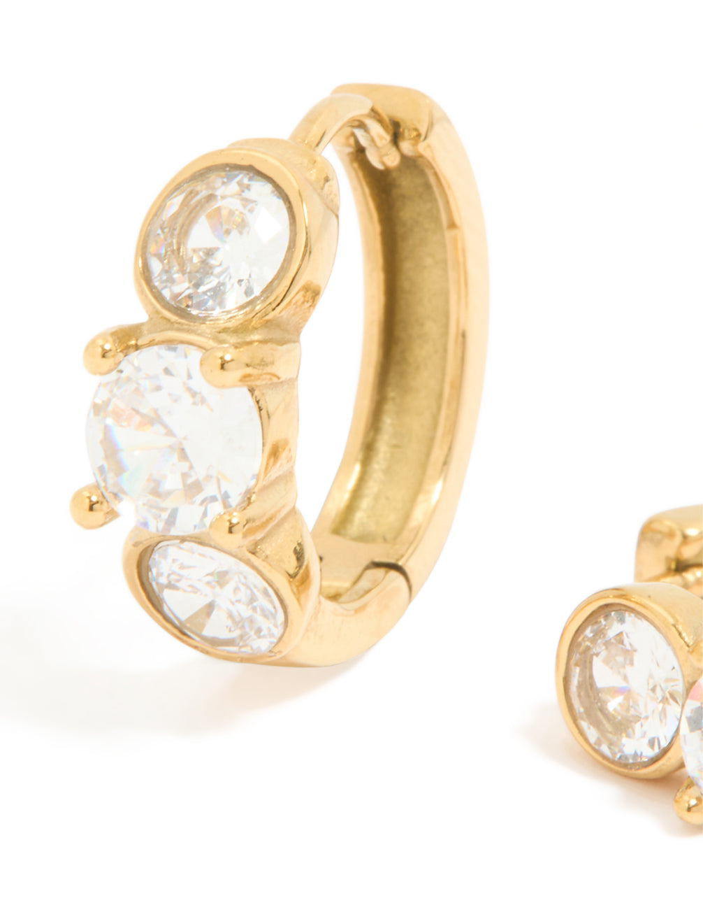 Displaying waterproof gold plated stainless steel cubic zirconia stone set huggie earrings close up view