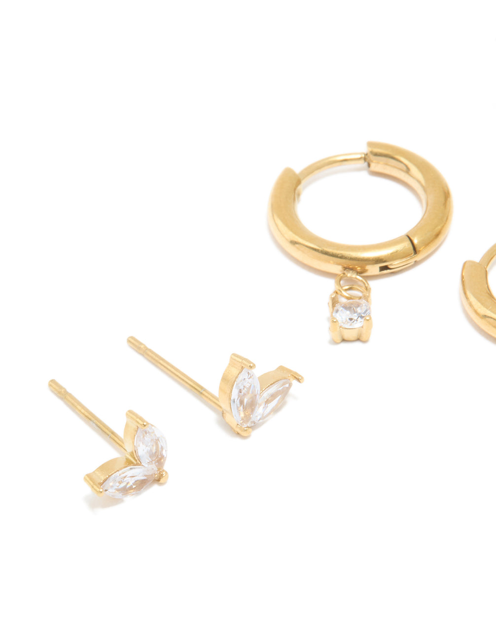 Featuring waterproof gold plated stainless steel cubic zirconia huggie and stud earrings set with butterfly charm and baguette stone cut close up view