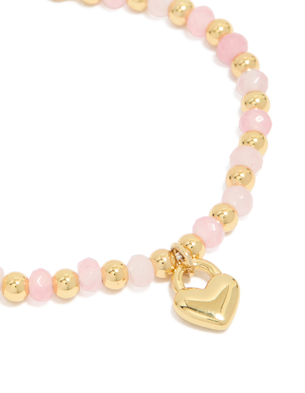 Featuring waterproof gold plated stainless steel bracelet with pink beads and heart charm in light pink close up view