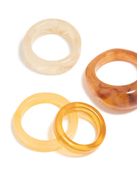 Showcasing chunky statement rings with marble pattern in wheat brown gold and beige, acrylic cigar bubble 6-pack close up view - link has visual effect only
