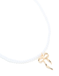Gold Pearl & Bow Necklace - link has visual effect only