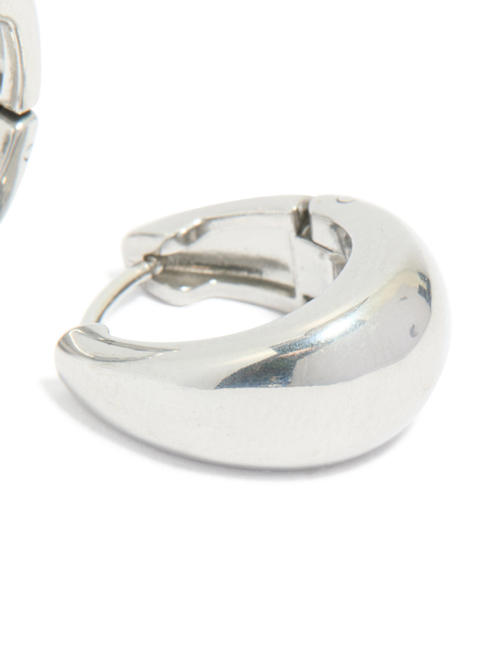 Presenting surgical steel bold oval hoop earrings in silver post detail view