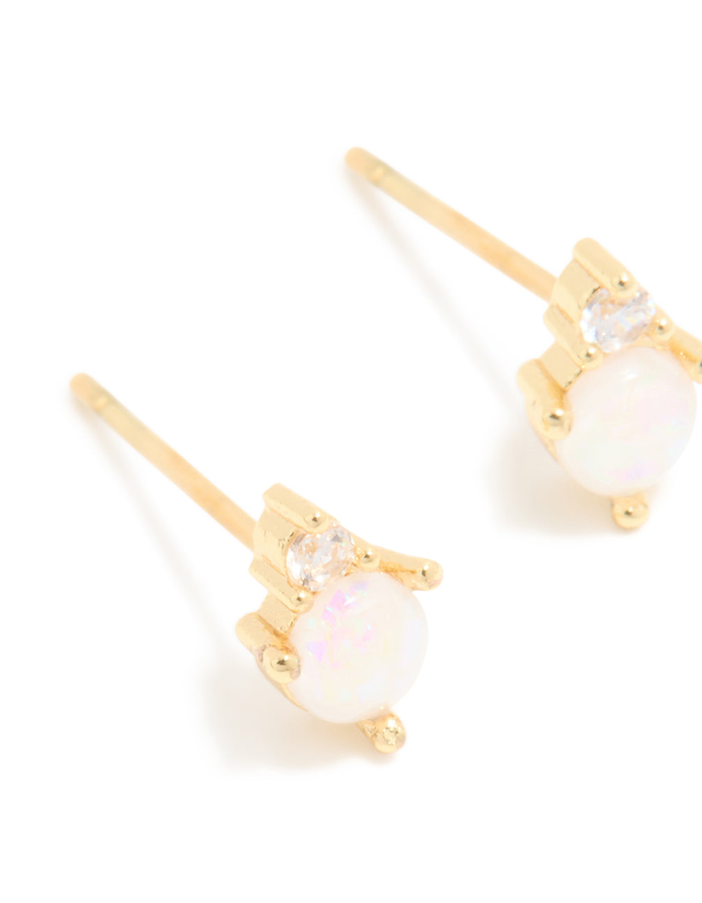These waterproof gold plated stainless steel October cubic zirconia duo stud earrings feature crystal stones in close up view
