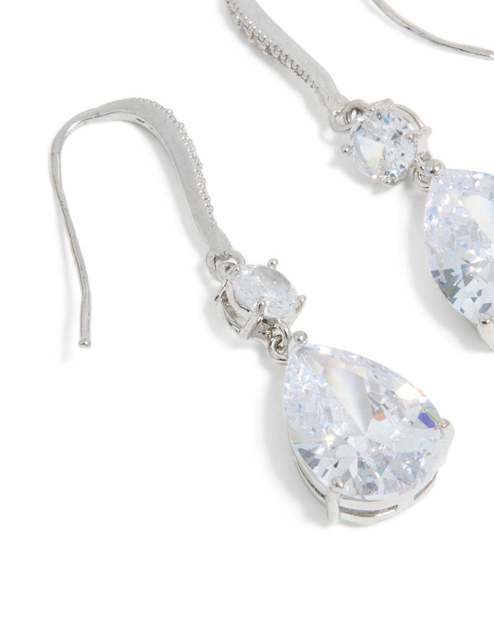 Sophisticated silver cubic zirconia pear drop earrings highlighting the teardrop cut and hook closure detail view