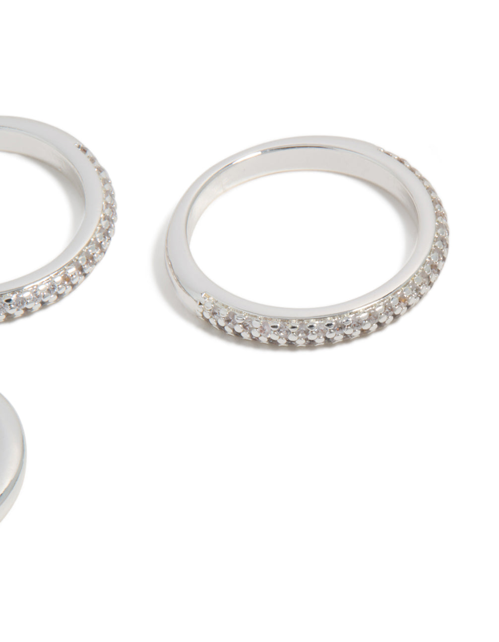 This silver plated cubic zirconia crystal band ring 3-pack shows close up view