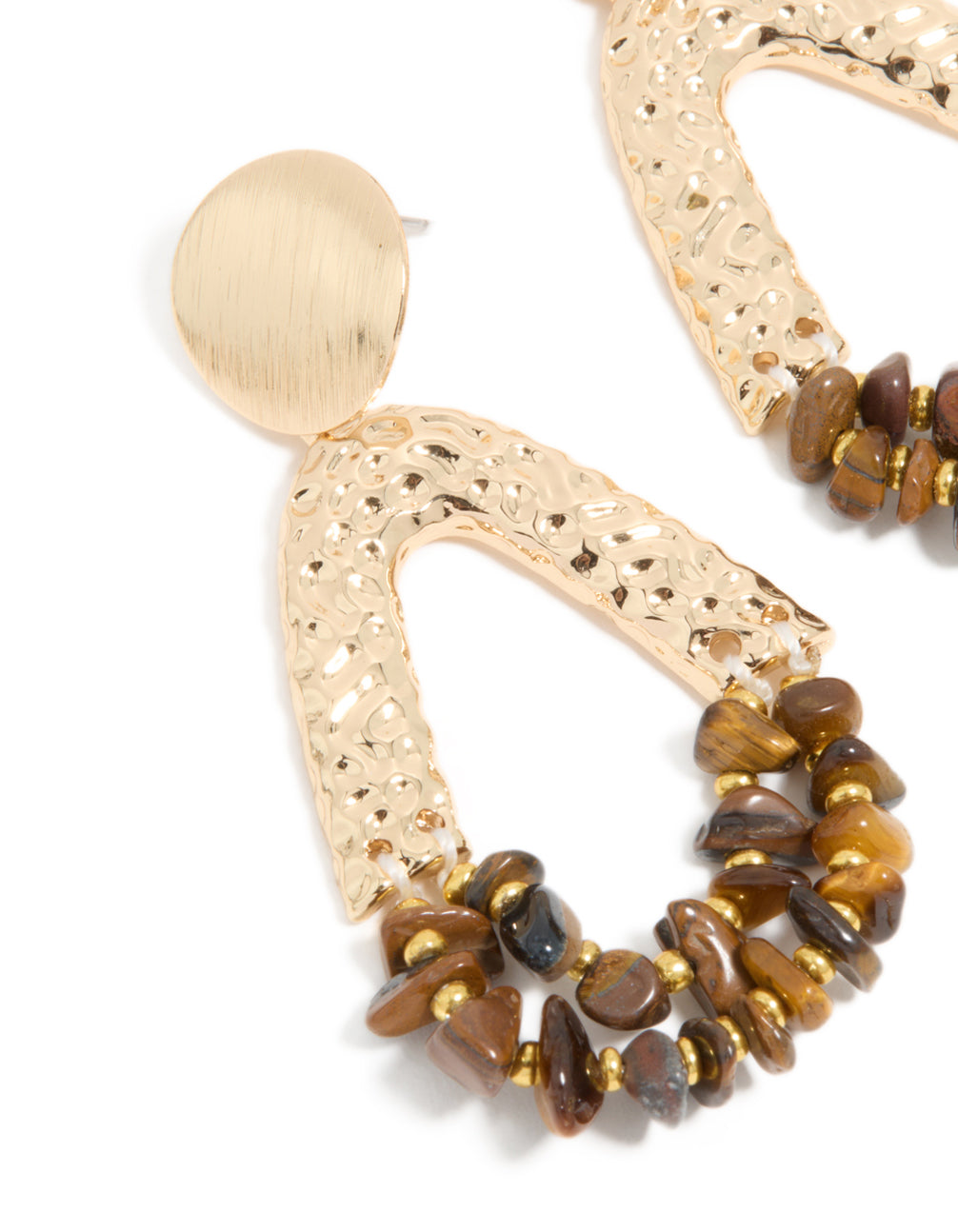 Showcasing gold tigers eye semi precious stone chip and molten drop earrings in statement style close up view