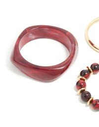 Gold & Burgundy Acrylic Bangles 3-Pack - link has visual effect only