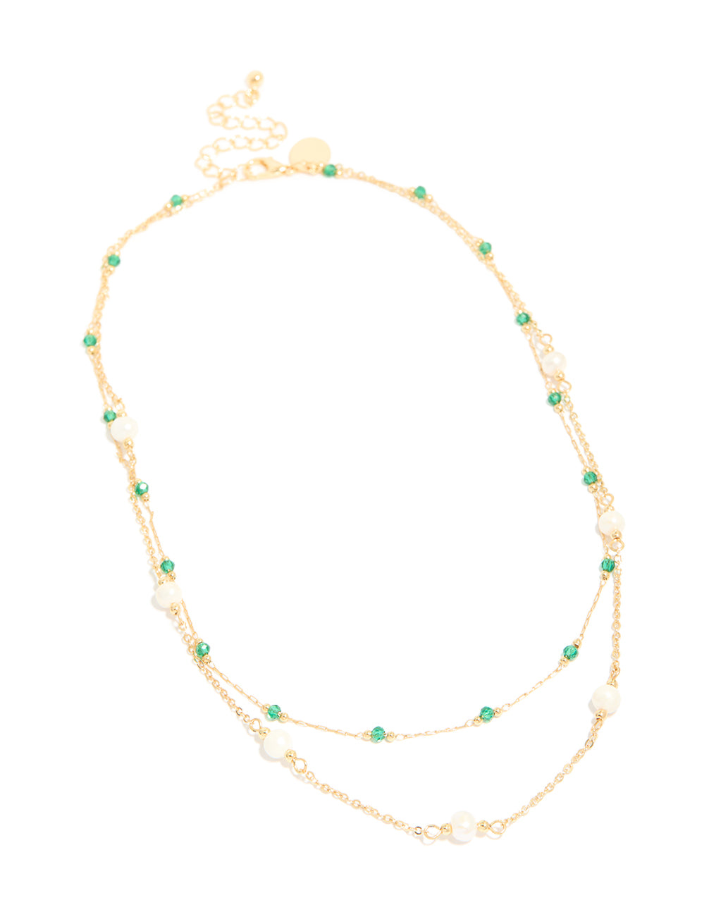 Showcasing a gold plated layered necklace with beads, emerald stone and pearl accents front view