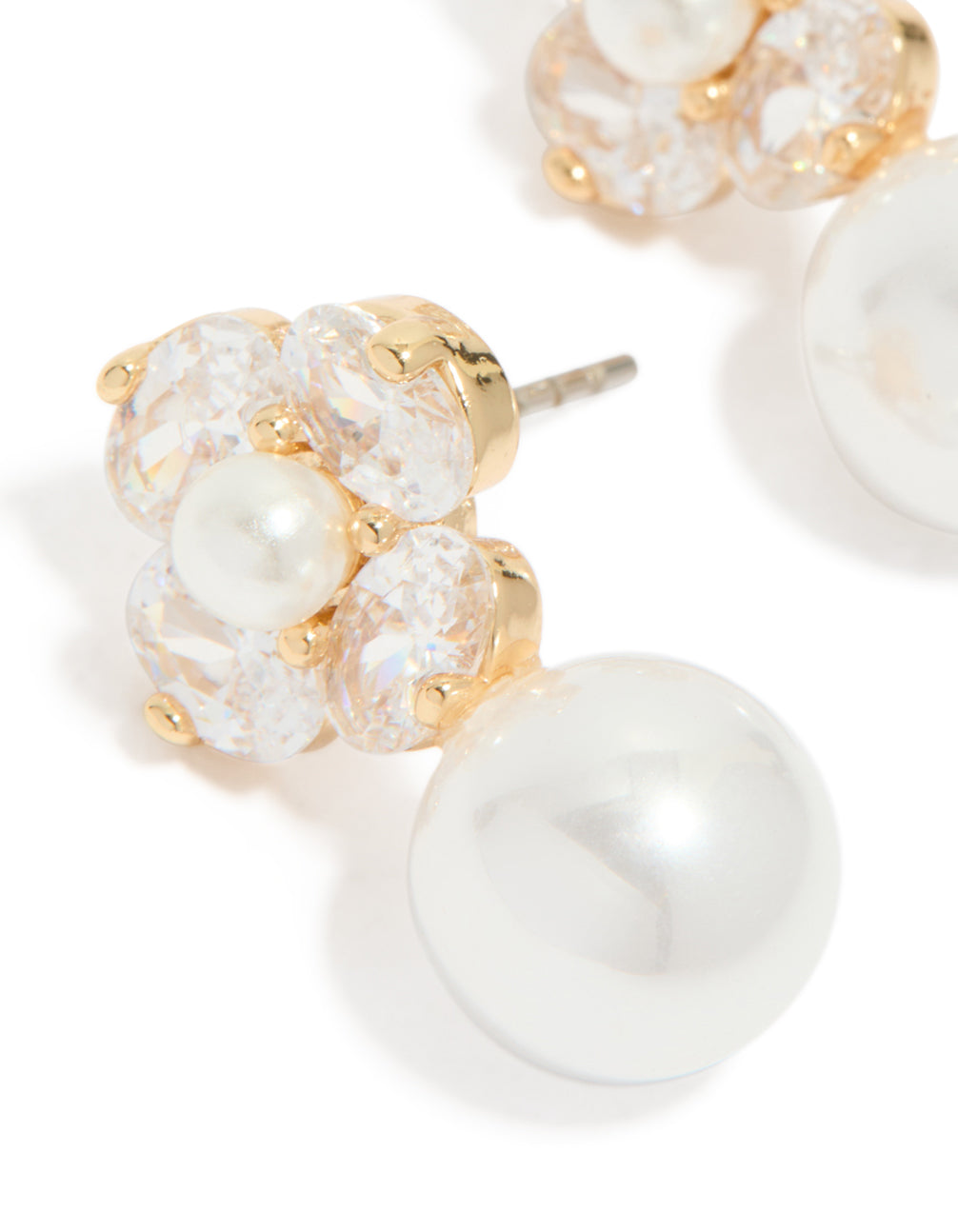 Detailed view of gold plated cubic zirconia flower and pearl drop earrings clear and ivory accents close up view