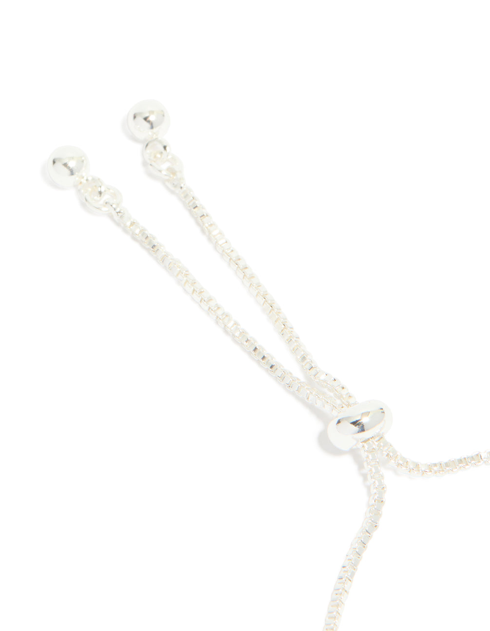Presenting a silver plated cubic zirconia thin tennis layered toggle bracelet closure detail view
