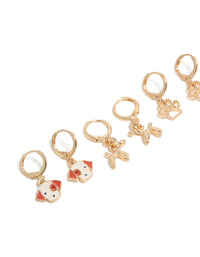 Kids Gold Dog & Paw Huggie Earrings 4-Pack - link has visual effect only