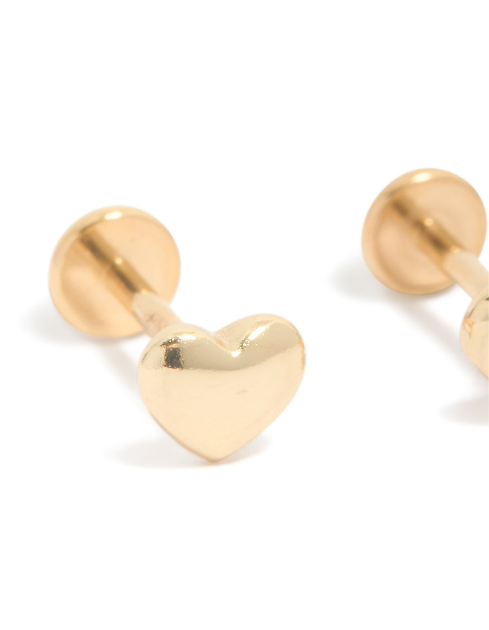 Featuring gold plated titanium heart flat back studs with smooth metal texture in a close up view