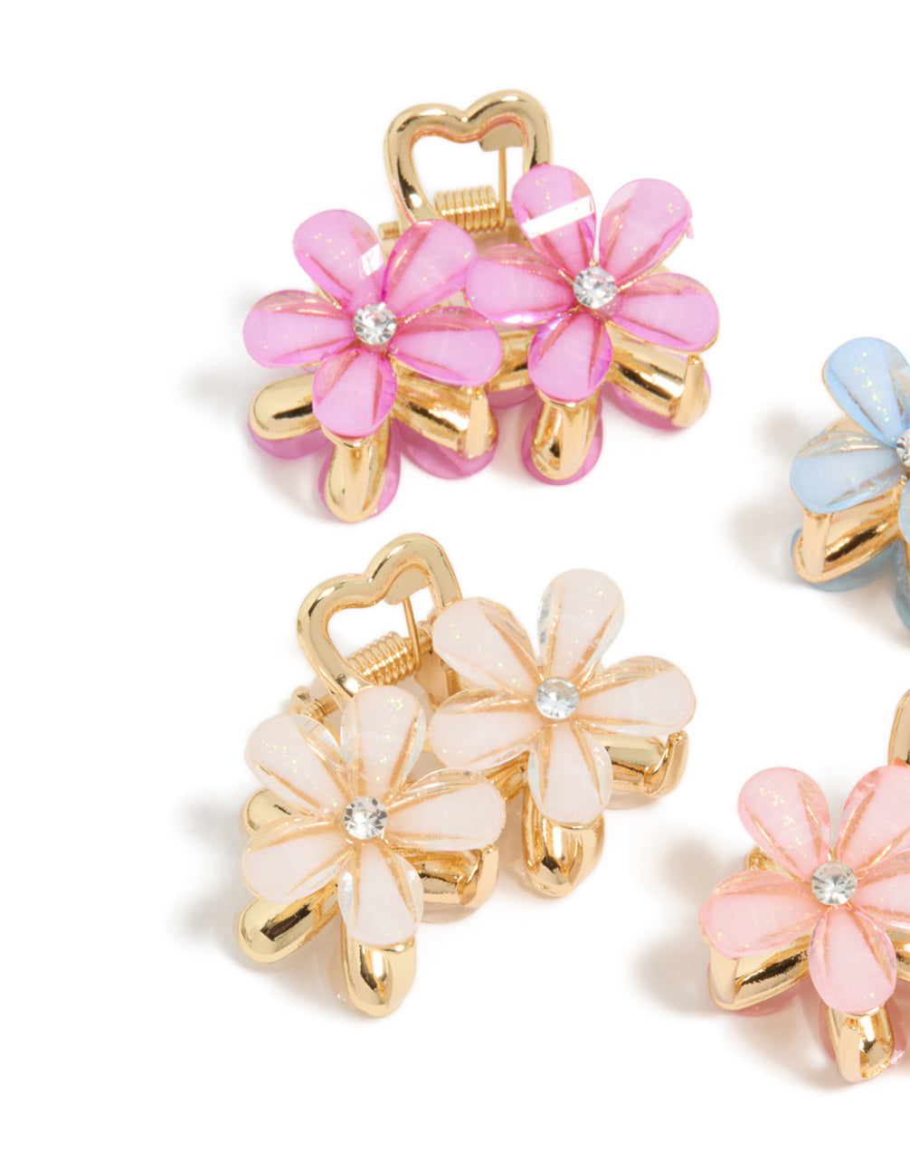 Crafted with gold double flower diamante claw clips in a 4-pack, floral pattern clasp detail view