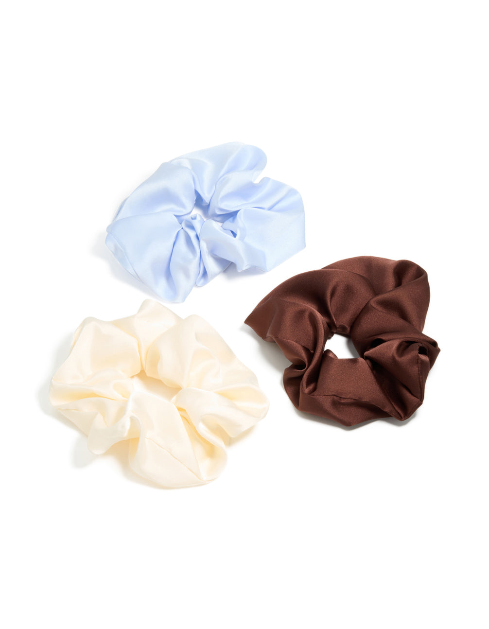 Presenting a satin fabric scrunchie 3-pack in solid white, blue, and brown front view
