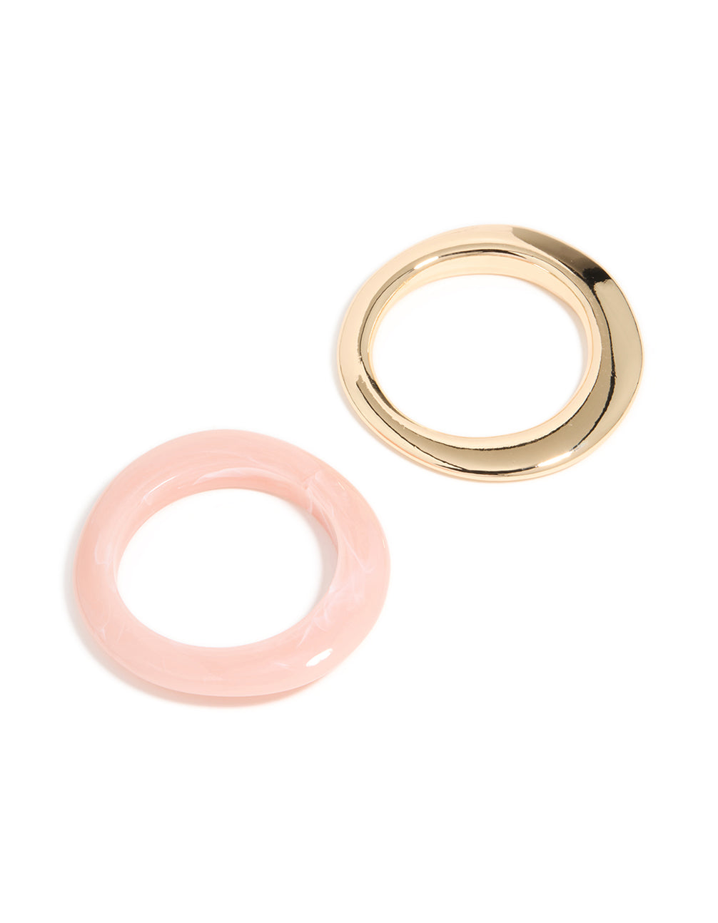 Featuring a 2-pack of chunky acrylic bangles in gold and pink front view