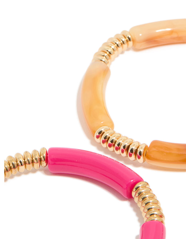 Showcasing brown and pink acrylic stretch bracelets in a 4-pack with gold accents close up view