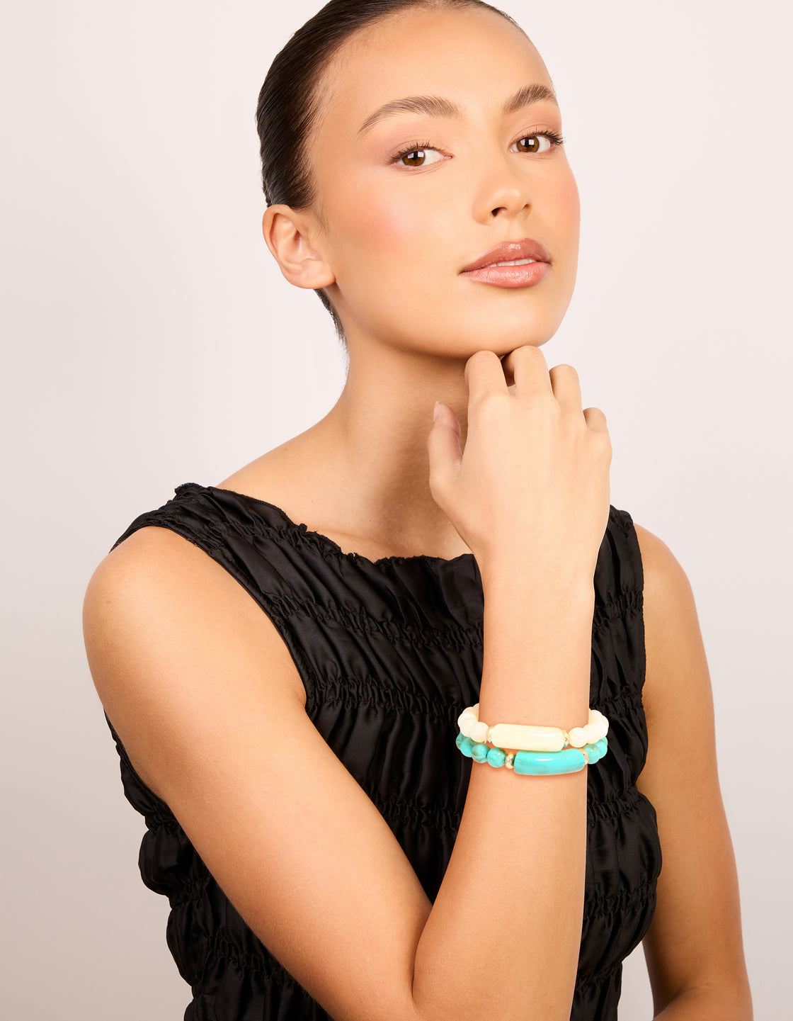 Discover turquoise and neutral beaded stretch bracelet 2-pack with gold accents on model view