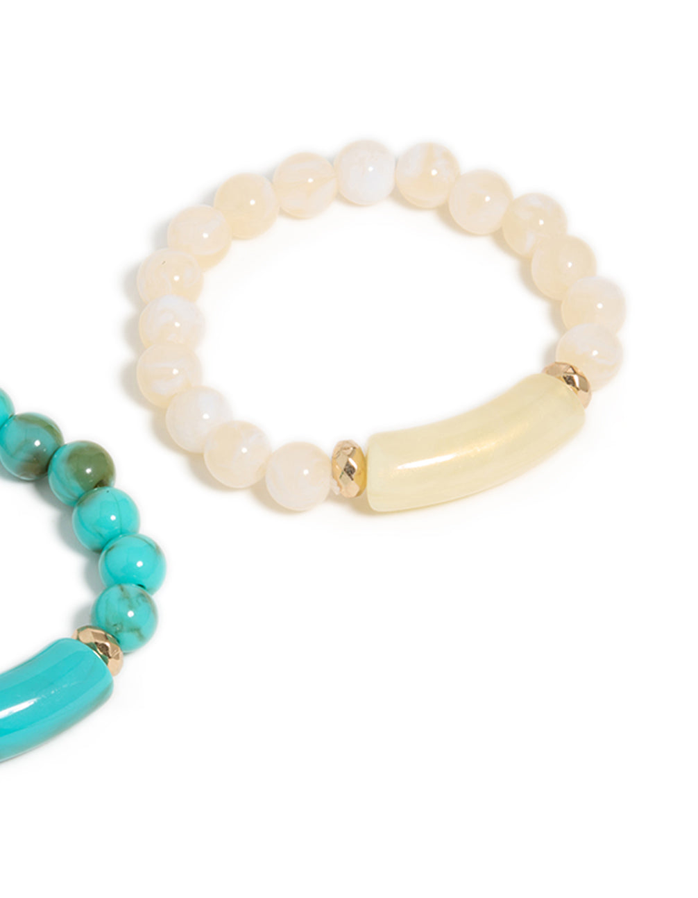 See this turquoise and neutral beaded stretch bracelet 2-pack featuring gold accents in close up view