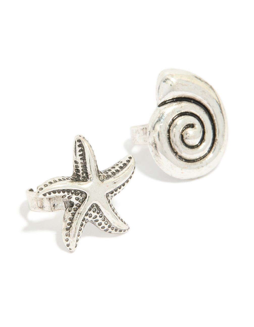 Showcasing antique silver sea-life large rings in a 3-pack, featuring charm shells and ocean-inspired motifs with a bold, statement style close up view