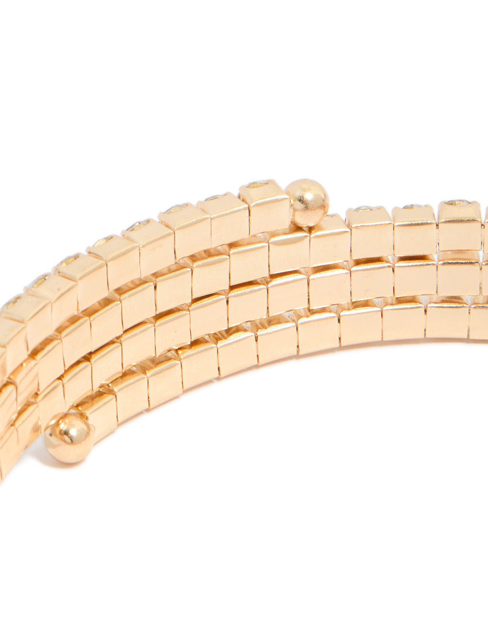 Showcasing gold diamante wrap round arm cuff featuring statement styling in close up view
