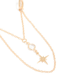 Featuring a gold celestial arm cuff with chain drop detail close up view - link has visual effect only
