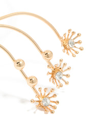 Showcasing diamante small flowers arm cuff in gold with ball feature close up view - link has visual effect only