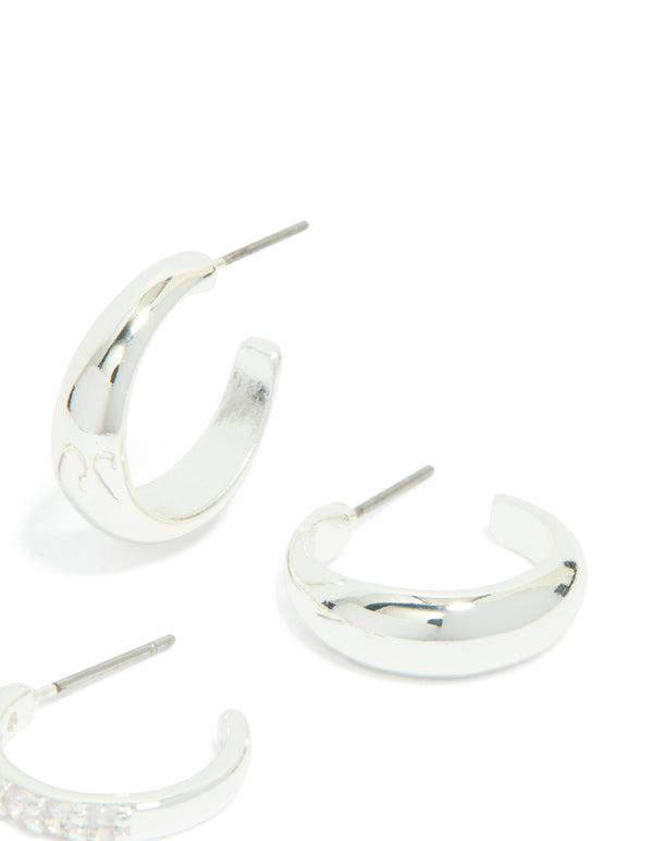 Featuring silver plated cubic zirconia and smooth hoop earrings in a 2-pack with crystal detailing post detail view