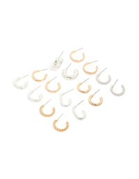 Showcasing mixed metal twisted and smooth hoop earrings in an 8-pack with gold and silver finishes front view - link has visual effect only