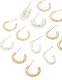 Featuring mixed metal twisted and smooth hoop earrings in an 8-pack with gold and silver finishes close up view - link has visual effect only