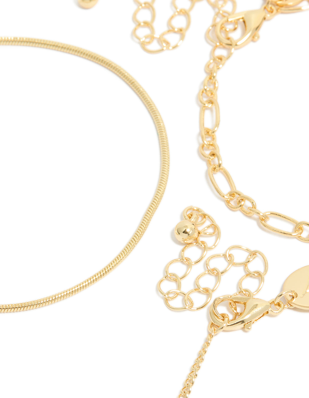 Featuring gold plated featuring cubic zirconia and chain bracelets in a 3-pack closure detail view