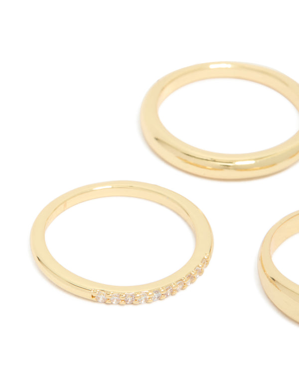 Elegant set of gold plated rings featuring cubic zirconia stones in a stackable chunky style close up view