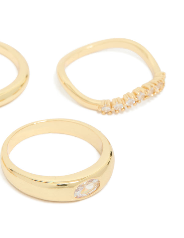 Crafted from gold plated material, this 4-pack of cubic zirconia and crystal rings designed with chunky stackable bands side detail view