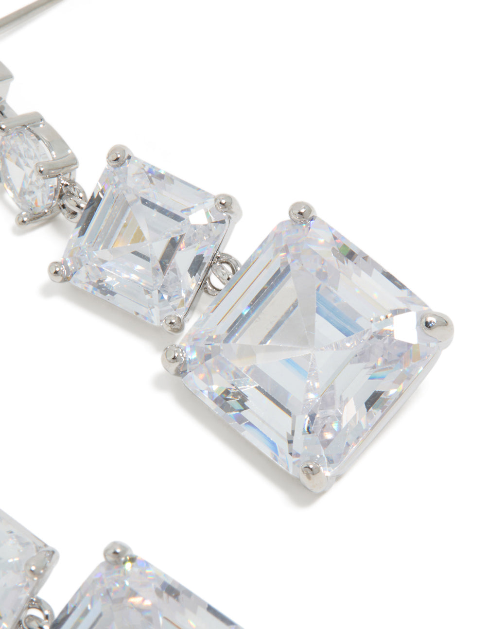 Presenting silver cubic zirconia square drop earrings in close up view