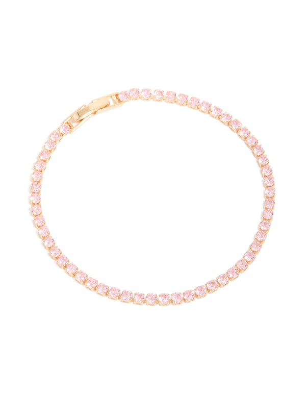 Featuring a gold pink cubic zirconia dainty tennis bracelet in light pink front view