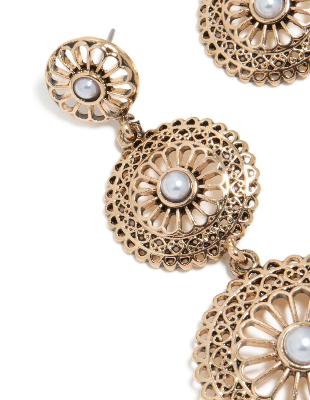 Crafted antique gold graduating disc and pearl drop earrings featuring statement style close up view