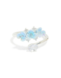 Highlighting the silver plated triple flower wrap ring in powder blue and statement style front view - link has visual effect only