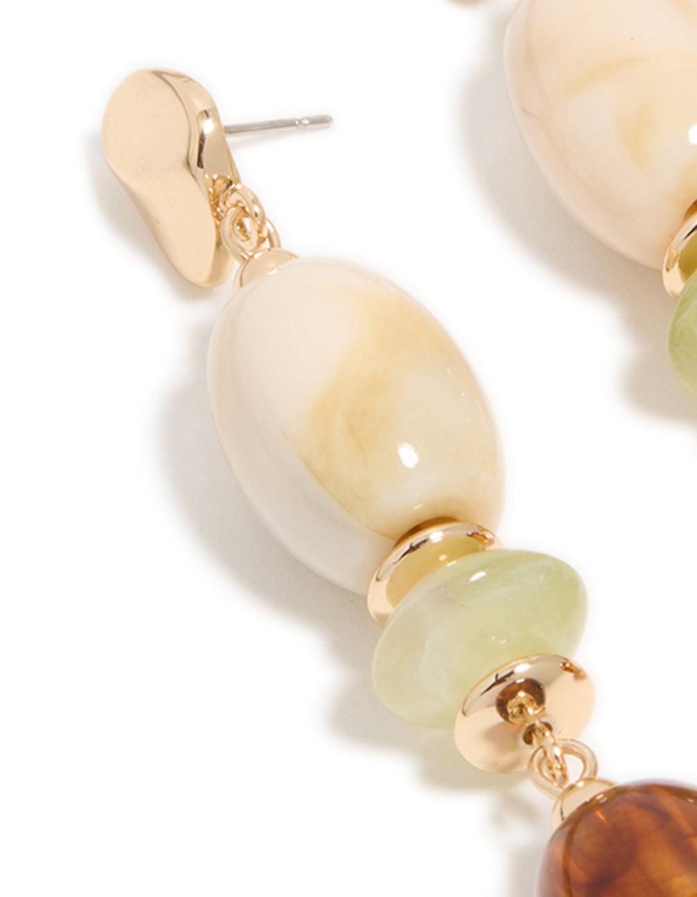 Elegant gold and acrylic mixed size beaded drop earrings close up view