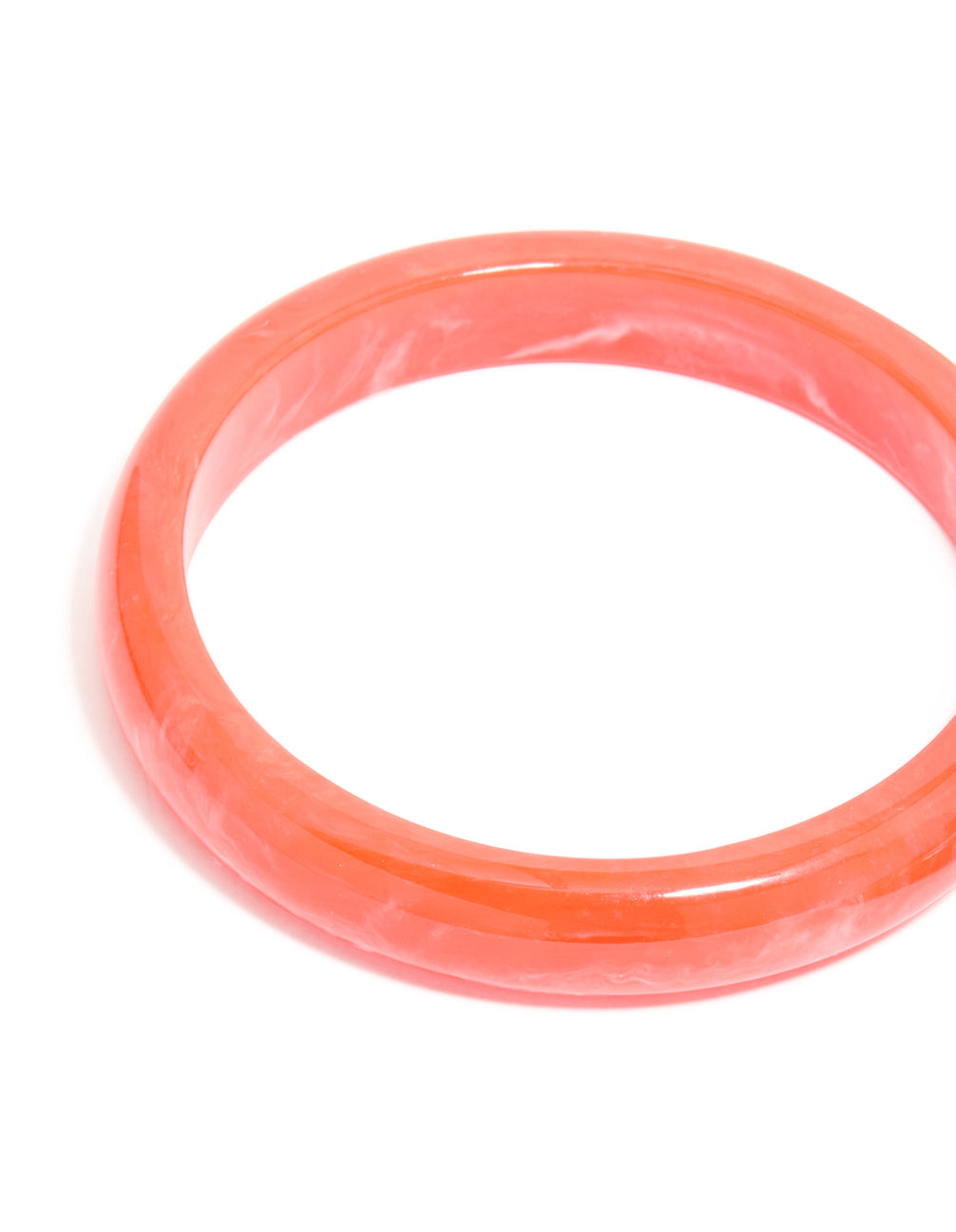 Showcasing acrylic coral thin bangles with marble pattern and gold accents in a 4-pack set close up view