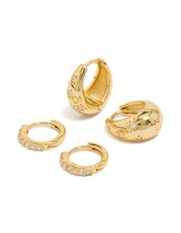 Showcasing dainty gold plated brass huggie earrings in a 2-pack featuring celestial star and teardrop designs with fine cubic zirconia crystal accents front view - link has visual effect only